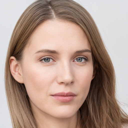 Neutral white young-adult female with long  brown hair and grey eyes