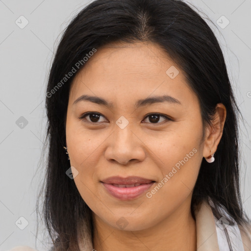 Joyful asian young-adult female with long  brown hair and brown eyes