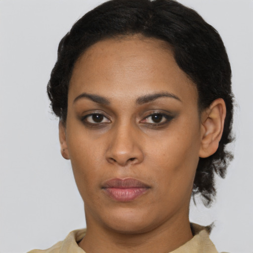 Neutral latino young-adult female with short  black hair and brown eyes