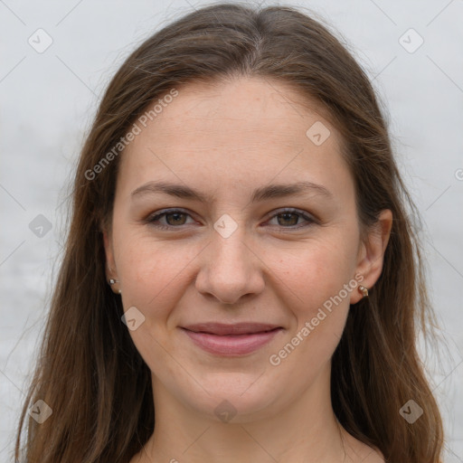 Joyful white young-adult female with long  brown hair and grey eyes