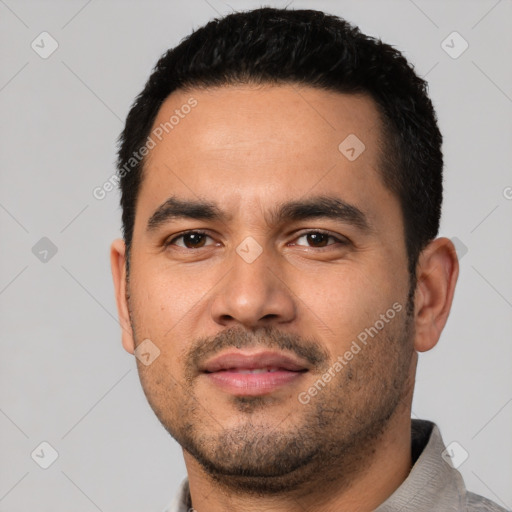 Neutral latino young-adult male with short  black hair and brown eyes