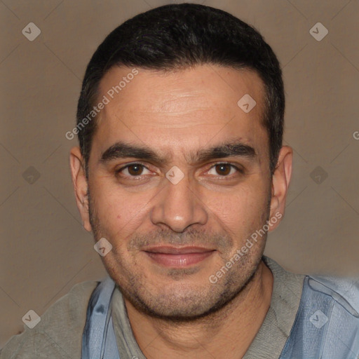 Joyful white adult male with short  black hair and brown eyes