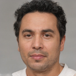 Neutral white adult male with short  brown hair and brown eyes