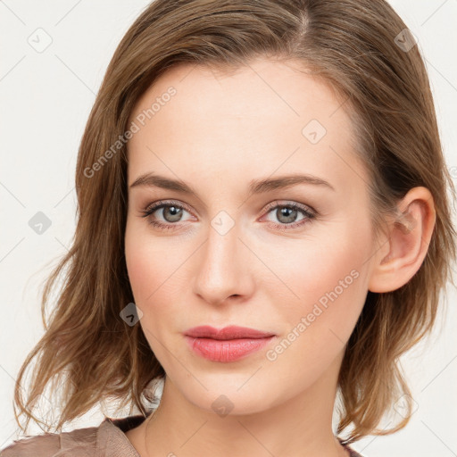 Joyful white young-adult female with long  brown hair and blue eyes