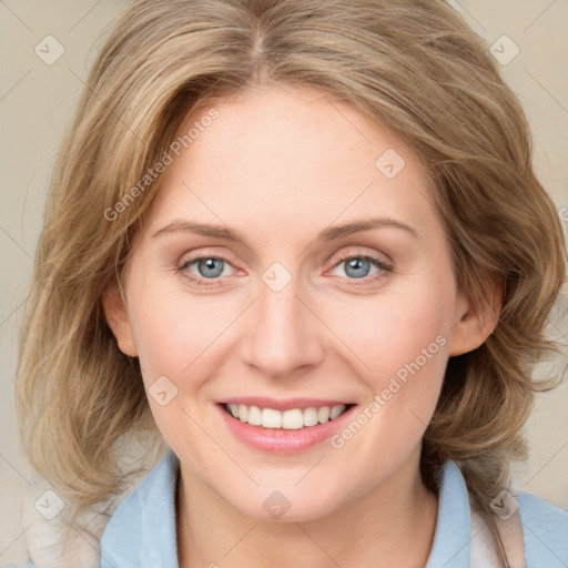 Joyful white young-adult female with medium  brown hair and blue eyes