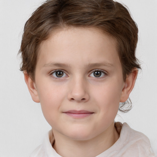 Joyful white child female with short  brown hair and brown eyes