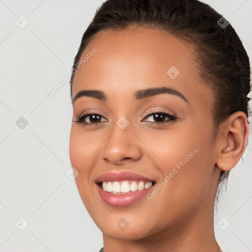 Joyful white young-adult female with short  brown hair and brown eyes