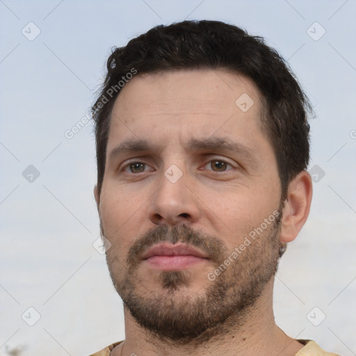 Neutral white adult male with short  brown hair and brown eyes