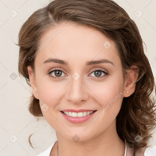 Joyful white young-adult female with medium  brown hair and green eyes