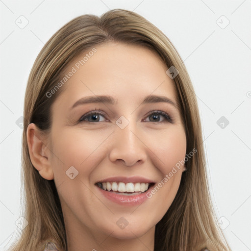 Joyful white young-adult female with long  brown hair and brown eyes