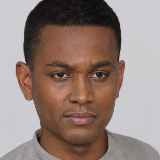 Neutral black young-adult male with short  black hair and brown eyes