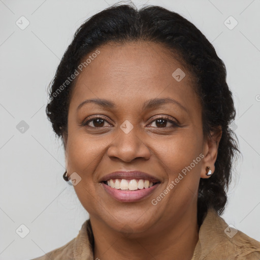 Joyful latino adult female with long  brown hair and brown eyes