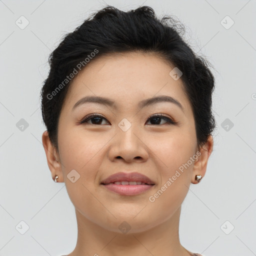 Joyful asian young-adult female with short  brown hair and brown eyes