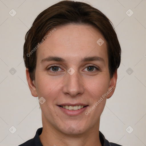 Joyful white young-adult female with short  brown hair and grey eyes