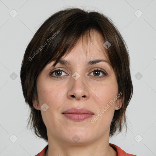 Joyful white adult female with medium  brown hair and grey eyes