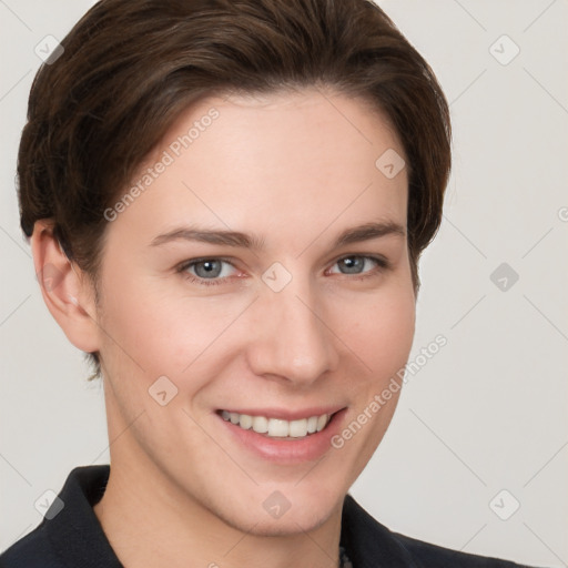 Joyful white young-adult female with short  brown hair and grey eyes