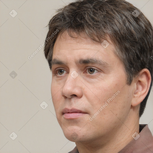 Neutral white adult male with short  brown hair and brown eyes