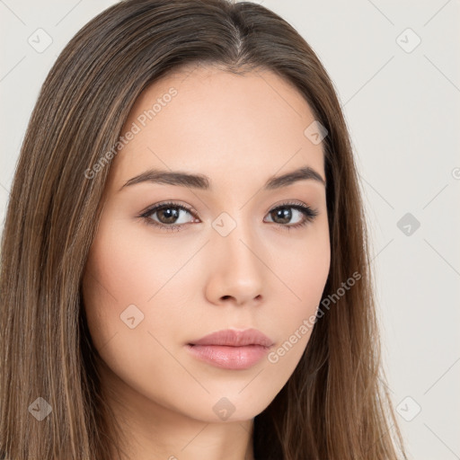 Neutral white young-adult female with long  brown hair and brown eyes