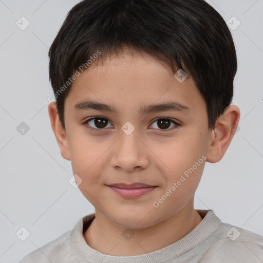 Joyful white child male with short  brown hair and brown eyes