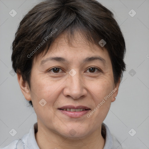 Joyful white adult female with short  brown hair and brown eyes