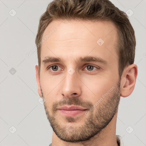 Neutral white young-adult male with short  brown hair and brown eyes