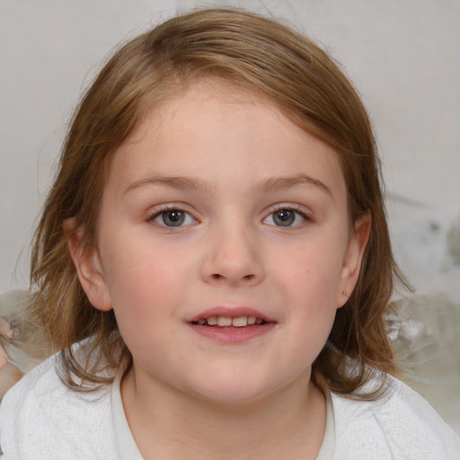 Joyful white child female with medium  brown hair and blue eyes