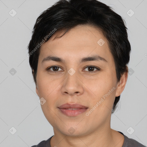 Joyful asian young-adult female with short  black hair and brown eyes