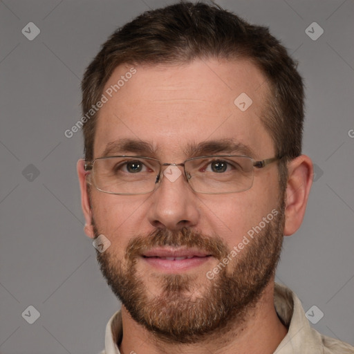 Joyful white adult male with short  brown hair and brown eyes