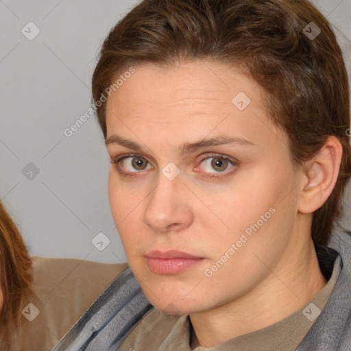 Neutral white young-adult female with medium  brown hair and brown eyes