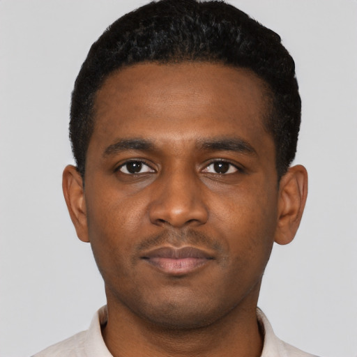 Neutral black young-adult male with short  black hair and brown eyes