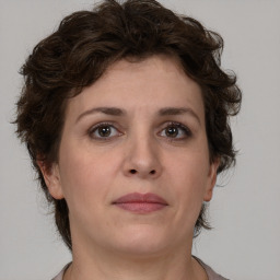 Neutral white young-adult female with short  brown hair and brown eyes