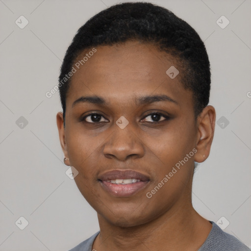 Joyful black young-adult female with short  black hair and brown eyes