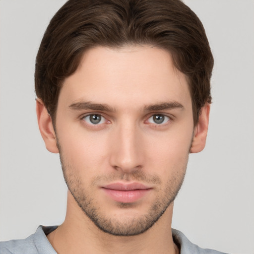 Neutral white young-adult male with short  brown hair and brown eyes