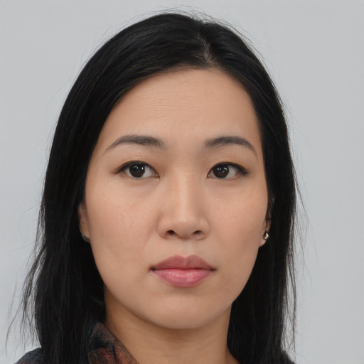 Neutral asian young-adult female with medium  black hair and brown eyes