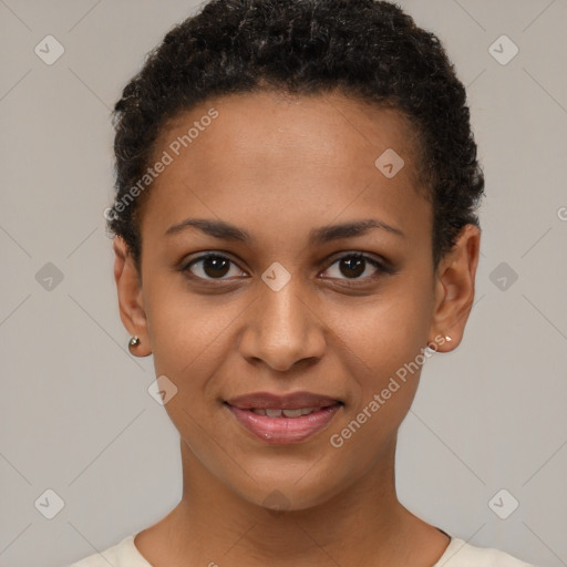 Joyful black young-adult female with short  brown hair and brown eyes