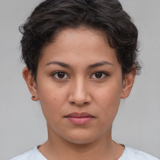 Neutral white young-adult female with short  brown hair and brown eyes