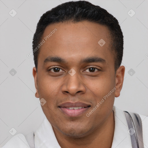 Joyful black young-adult male with short  black hair and brown eyes