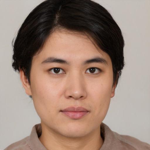 Neutral asian young-adult male with short  brown hair and brown eyes