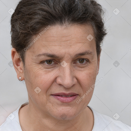 Joyful white adult female with short  brown hair and brown eyes