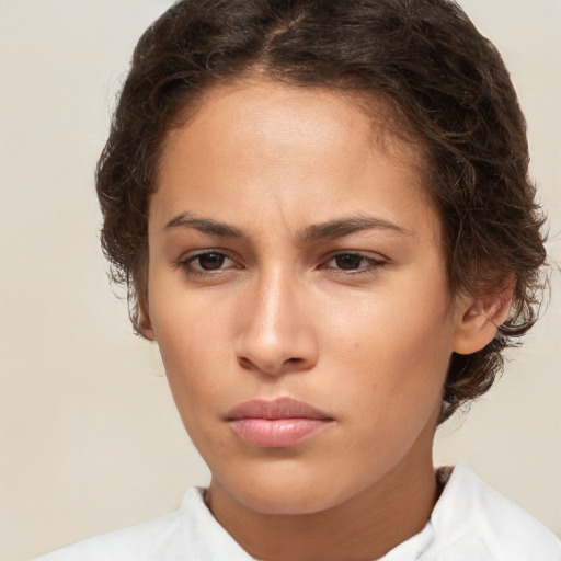 Neutral white young-adult female with short  brown hair and brown eyes