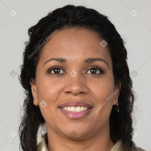 Joyful latino young-adult female with long  brown hair and brown eyes