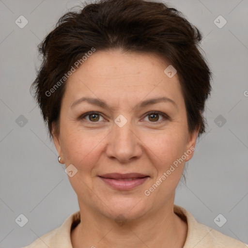 Joyful white adult female with short  brown hair and brown eyes