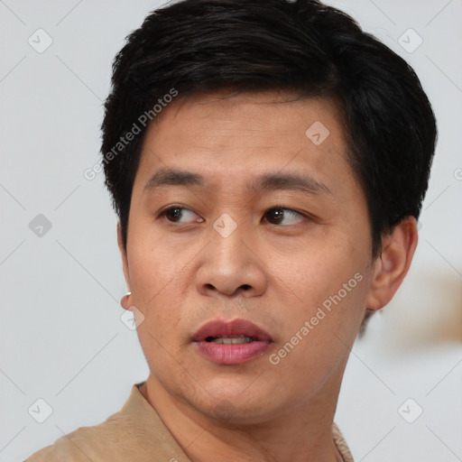 Neutral asian young-adult male with short  black hair and brown eyes