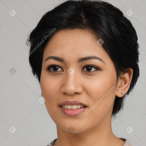 Joyful asian young-adult female with medium  black hair and brown eyes