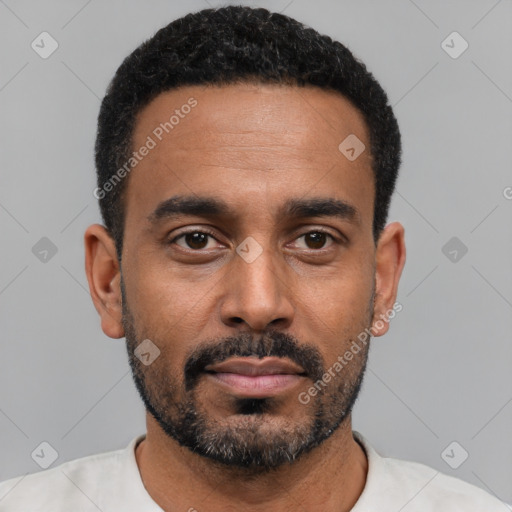 Neutral black young-adult male with short  black hair and brown eyes