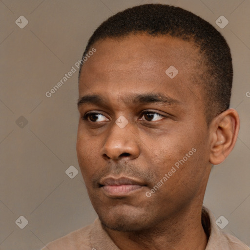 Neutral black young-adult male with short  black hair and brown eyes
