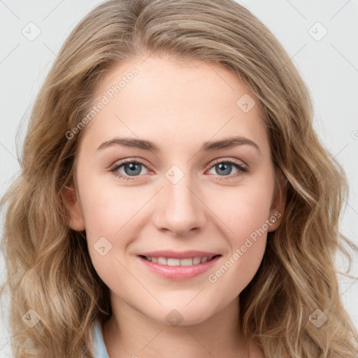 Joyful white young-adult female with long  brown hair and blue eyes