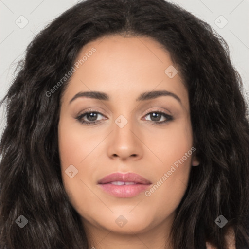 Joyful latino young-adult female with long  brown hair and brown eyes