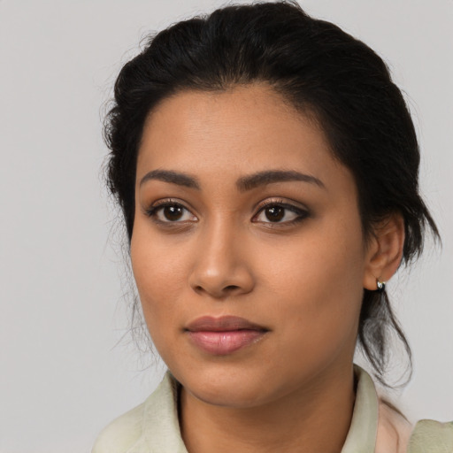 Neutral latino young-adult female with medium  black hair and brown eyes