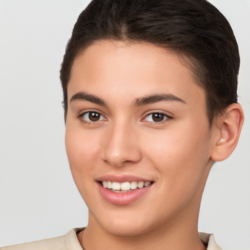 Joyful white young-adult female with short  brown hair and brown eyes